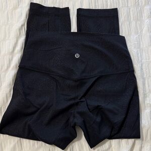 Lululemon Black High-Waisted Leggings 25” subtle animal print